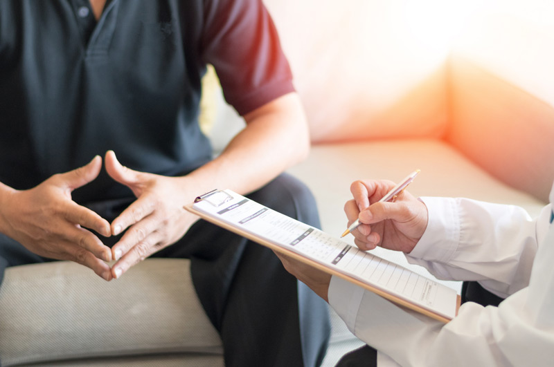 Doctor-creating-treatment-plan-for-urinary-storage-and-voiding-dysfunction