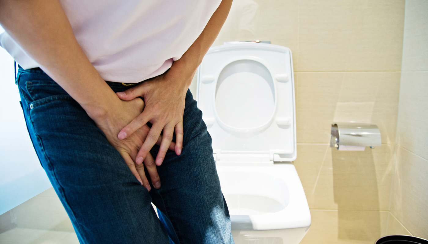 Man-experiencing-urinary-urgency