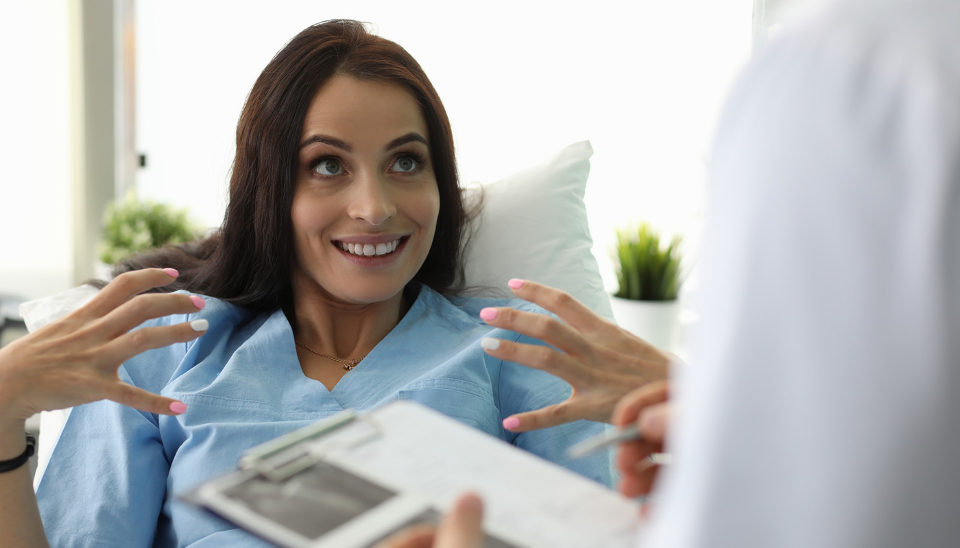 woman-discussing-goals-with-surgeon